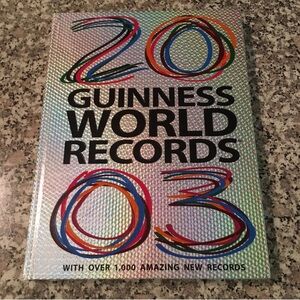2003 book Guinness World Records hardcover photos illustrations web videos